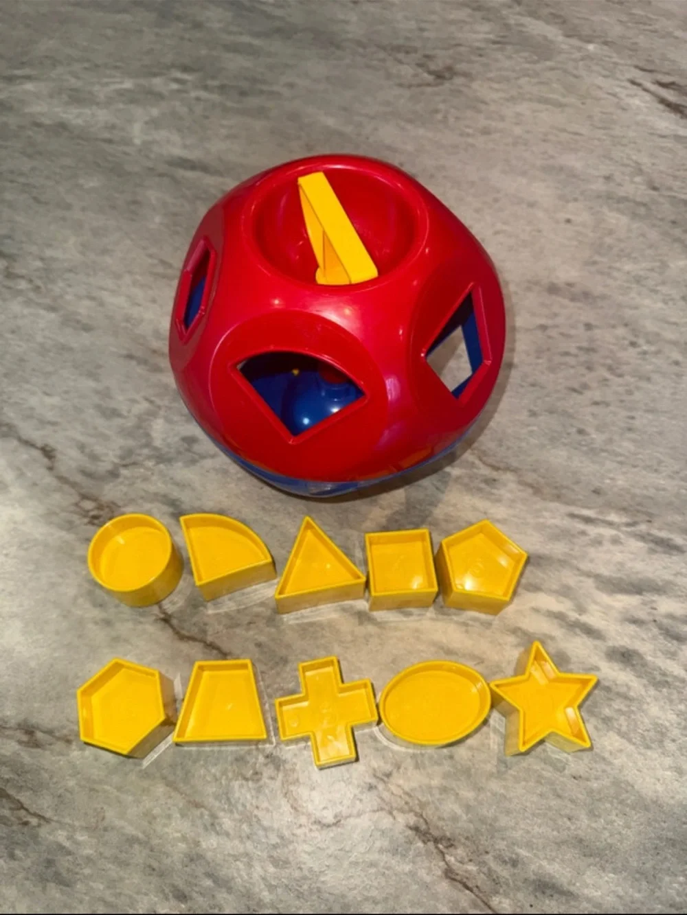 Tupperware Red Shape Sorter Ball with Yellow Geometric Pieces